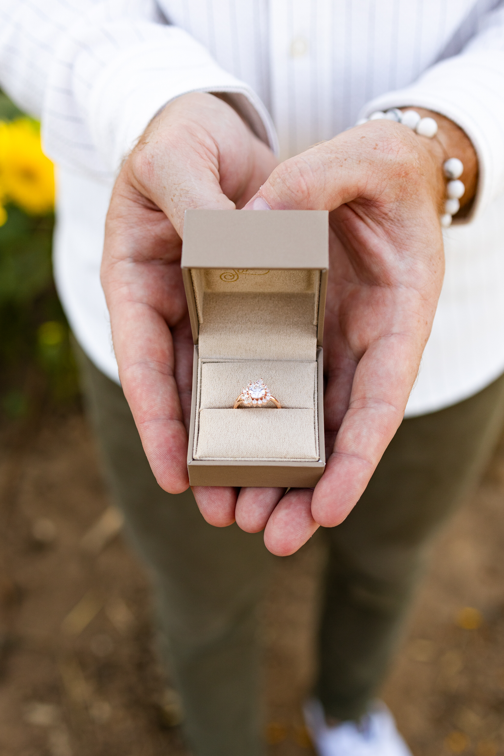 An engagement ring in its box.
