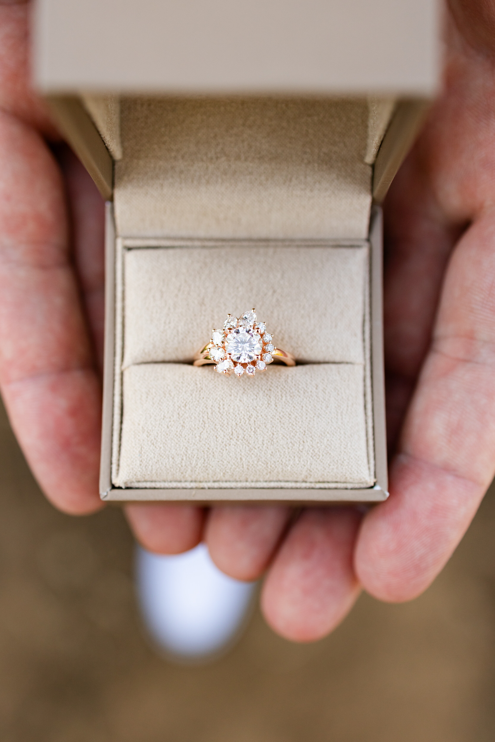 An engagement ring in its box.