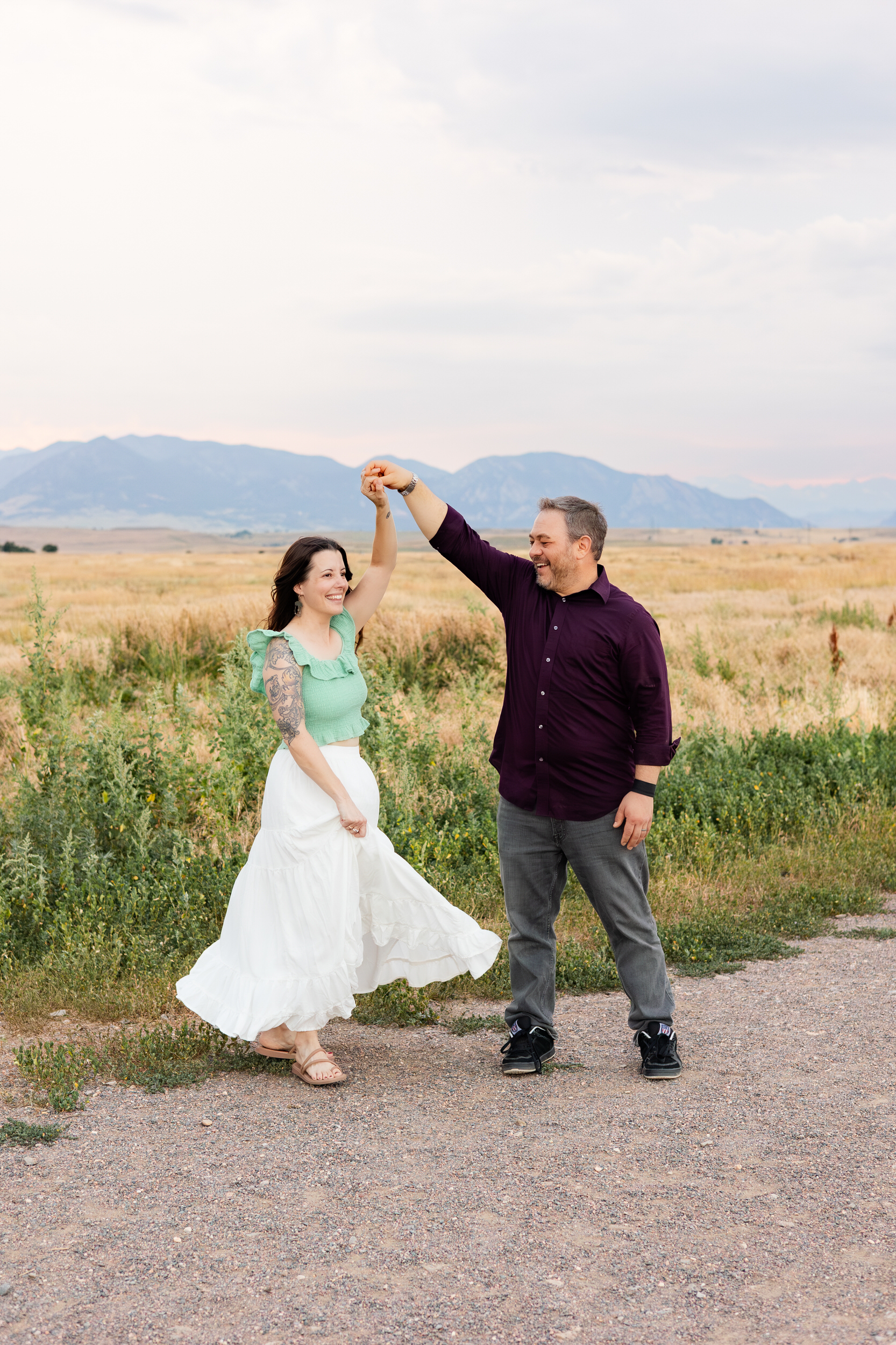 Husband twirls wife