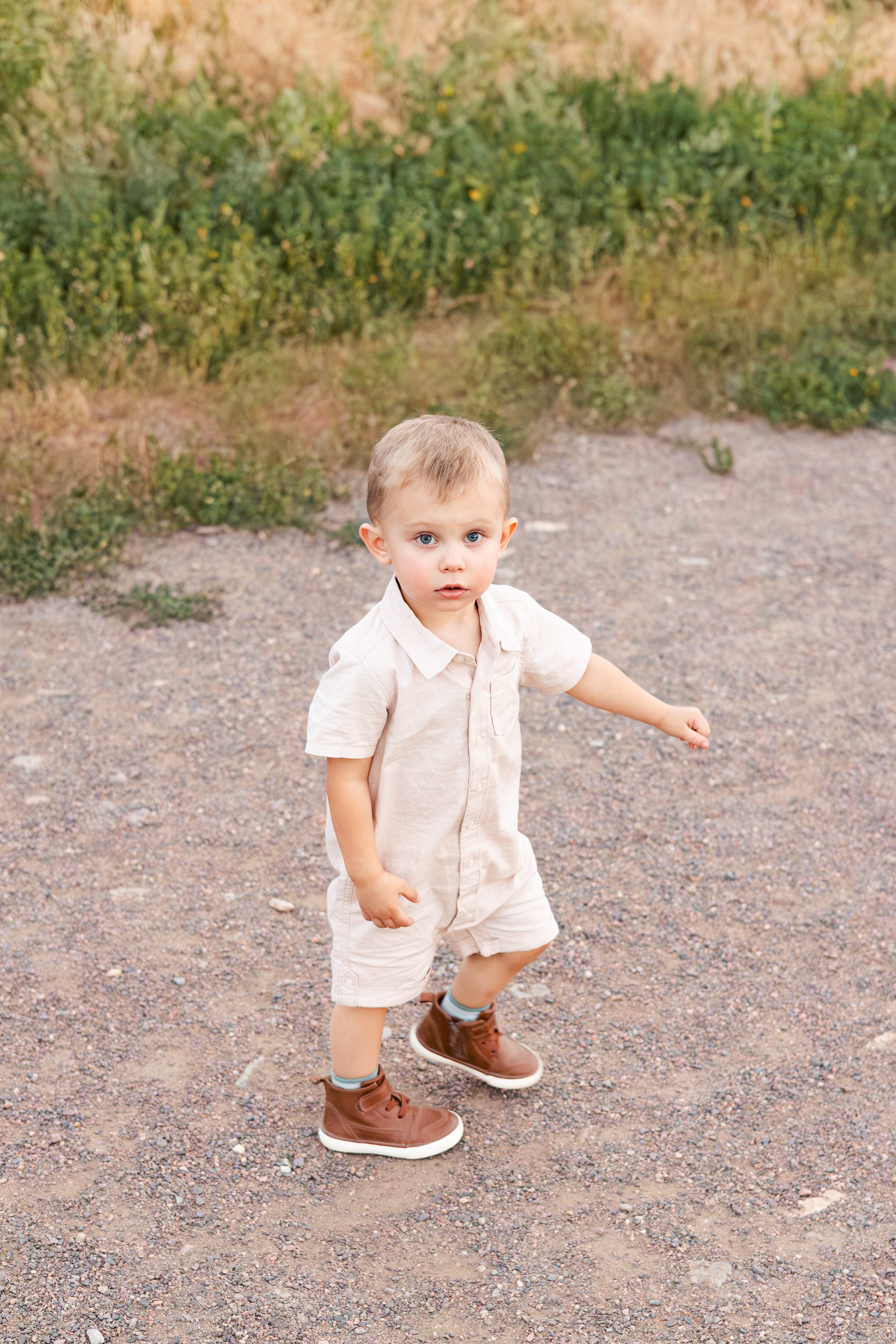 Toddler boy looks at the camera