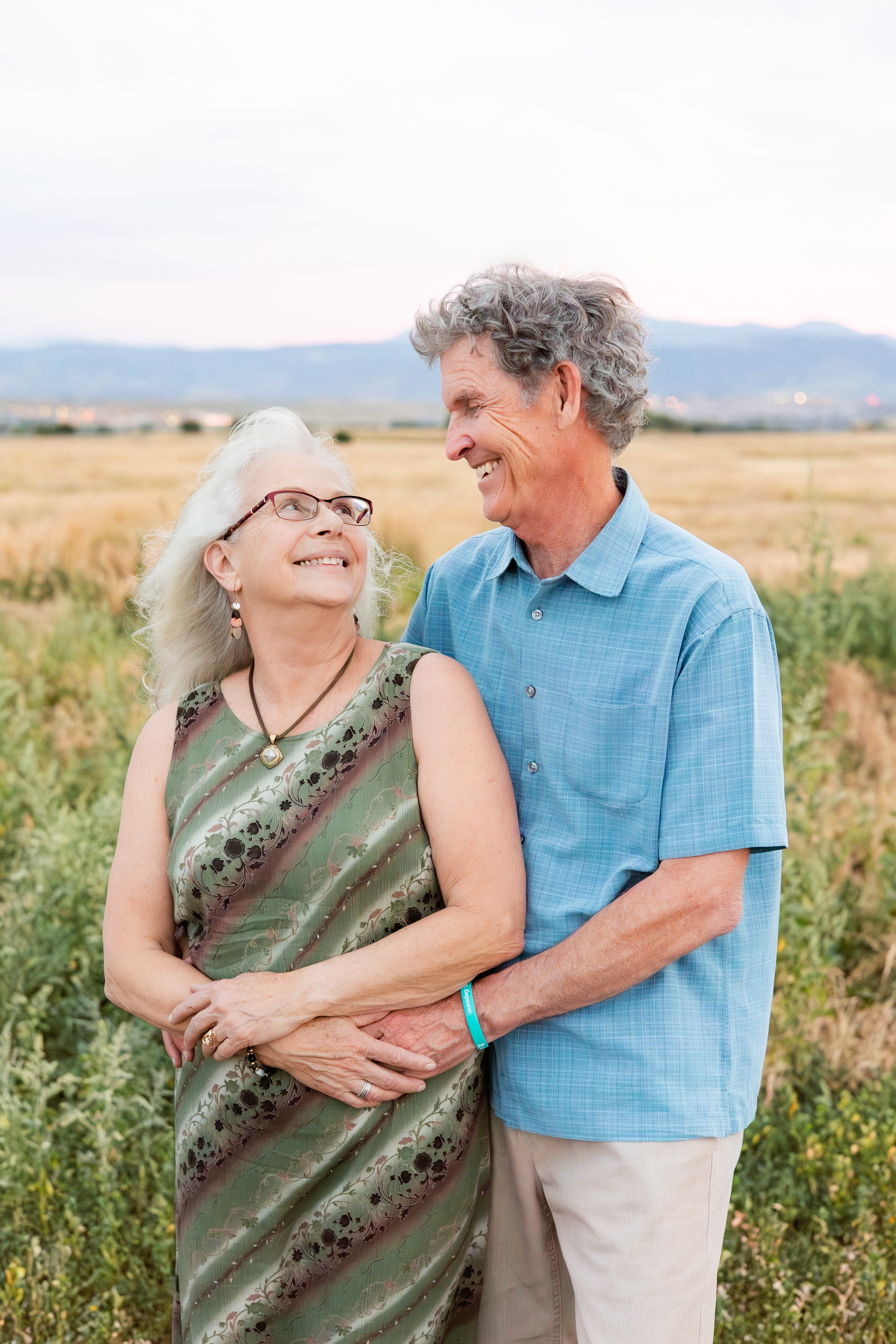 Husband and wife smile at each other