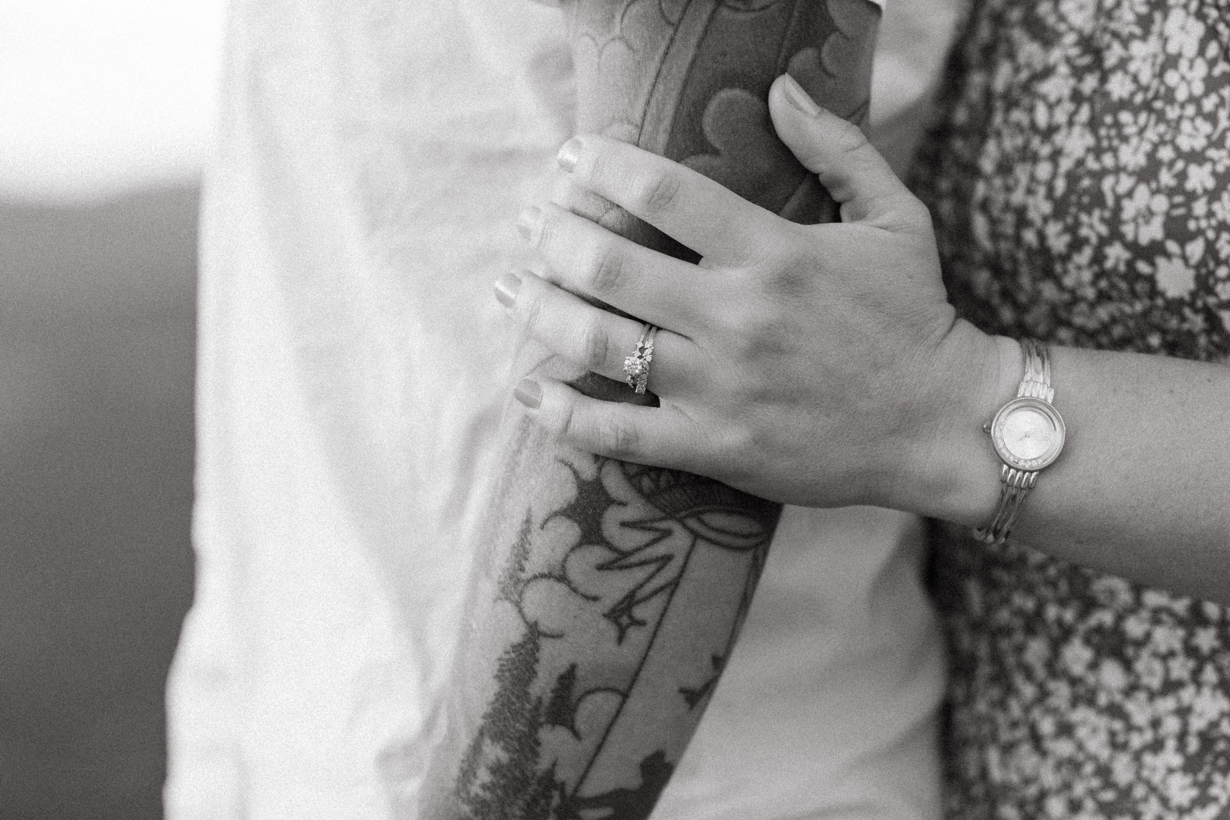 Close up of wife's wedding rings.